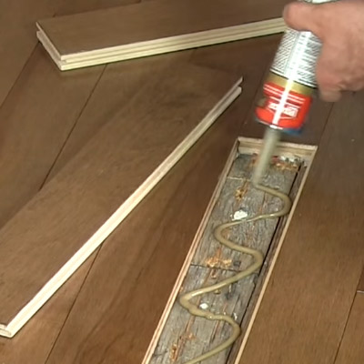 Fix damaged wood floors with new planks