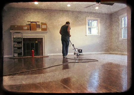 Hardwood floor refinishing project in progress